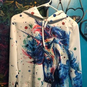 Unicorn sweater and Winnie the poo pajama top